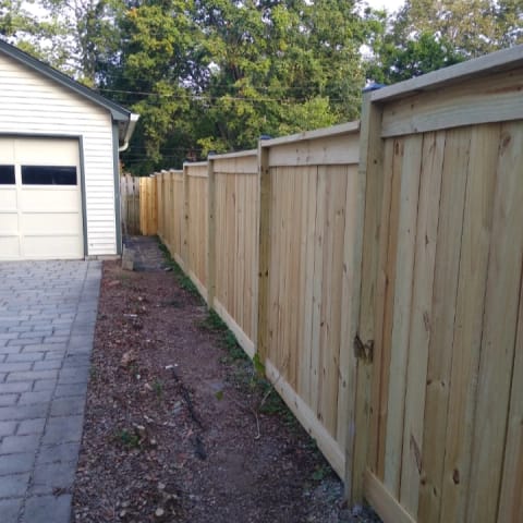 Cap-and-trim privacy fence